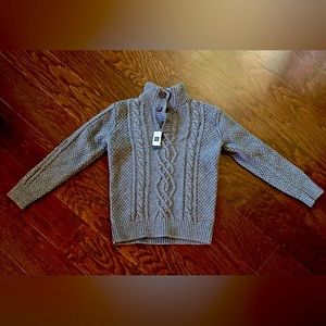 This boys size 10, never worn cozy cable mocknexk sweater by Gap.